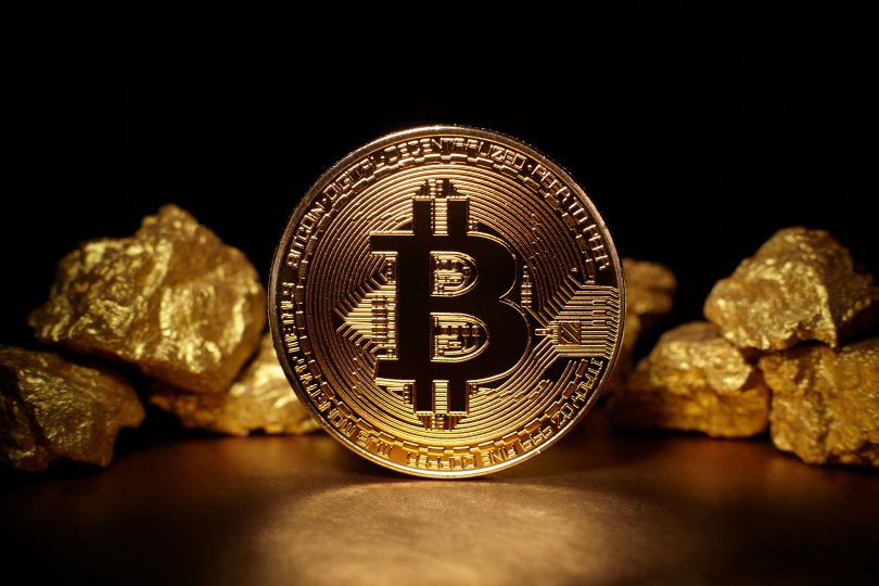 Gold Nuggets with a Bitcoin Coin surrounding it