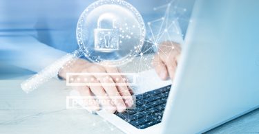 Man using computer privately with graphics overlaid on picture