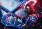 Man with red light saber sitting in blue white and red colored backdrop of geometric boxes type metaverse with headset on